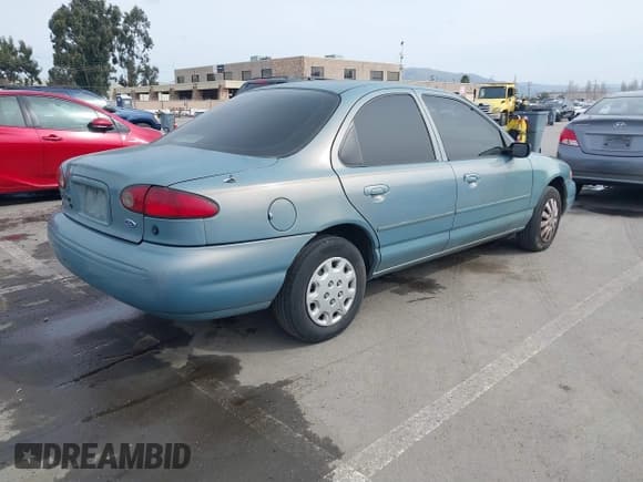✅ 1997 Ford Contour LX • VIN: 1FALP6533VK156310 • Лот: 41567292. Опубликован ранее на IAAI с пробегом 79 619 миль. Бесплатный доступ к архиву аукционных продаж из США и подробный отчёт об истории автомобиля на DreamBid. Изображение 4.