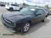2014 Dodge Challenger R/T z VIN 2C3CDYBT6EH229572, wystawiony jako IAAI lot #43326778 z przebiegiem 125 314 mil mil oraz . Historia ofert i sprzedaży dostępna na DreamBid. Obrazek 2.
