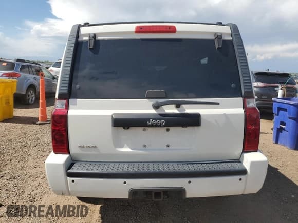 ✅ 2009 Jeep Commander Sport • VIN: 1J8HG48K59C549743 • Lot: 81011185. Wystawiony na Copart z przebiegiem 171 841 mil. Bezpłatny archiwum sprzedaży aukcyjnych z USA i szczegółowy raport historii pojazdu na DreamBid. Zdjęcie 6.