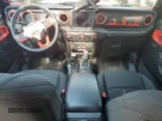 ✅ 2022 Jeep Gladiator Texas Trail • VIN: 1C6HJTAG9NL125170 • Лот: 60201505. Опубликован ранее на Copart с пробегом 66 881 миль. Бесплатный доступ к архиву аукционных продаж из США и подробный отчёт об истории автомобиля на DreamBid. Изображение 8.