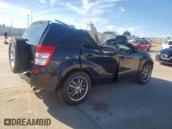 ✅ 2007 Suzuki Grand Vitara • VIN: JS3TE941X74202046 • Lot: 80221394. Listed on Copart with 153,791 mi. Free auction sales archive from the USA and detailed vehicle history report at DreamBid. Image 3.