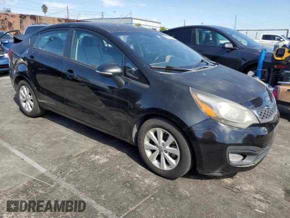✅ 2014 Kia Rio EX • VIN: KNADN4A3XE6378735 • Lot: 89665715. Listed on Copart with 96,582 mi. Free auction sales archive from the USA and detailed vehicle history report at DreamBid. Image 4.
