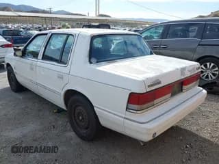 ✅ 1991 Plymouth Acclaim • VIN: 1P3XA4634MF582546 • Lot: 41657565. Wystawiony na IAAI z przebiegiem 85 985 mil. Bezpłatny archiwum sprzedaży aukcyjnych z USA i szczegółowy raport historii pojazdu na DreamBid. Zdjęcie 3.