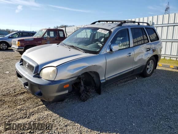 2002 Hyundai Santa Fe GLS z VIN KM8SC73D92U182330, wystawiony jako Copart lot #41827535 z przebiegiem 177 157 mil mil oraz Szkoda całkowita • Salvage title. Historia ofert i sprzedaży dostępna na DreamBid. Obrazek 1.