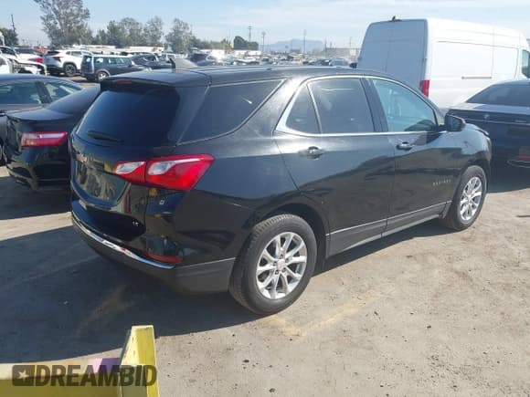 ✅ 2018 Chevrolet Equinox LT • VIN: 2GNAXJEVXJ6283534 • Lot: 43512156. Listed on IAAI with 105,451 mi. Free auction sales archive from the USA and detailed vehicle history report at DreamBid. Image 4.