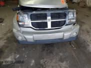 ✅ 2009 Dodge Nitro SLT • VIN: 1D8GU58KX9W530896 • Lot: 91293095. Wystawiony na Copart z przebiegiem Nie podano. Bezpłatny archiwum sprzedaży aukcyjnych z USA i szczegółowy raport historii pojazdu na DreamBid. Zdjęcie 12.