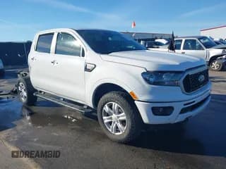 ✅ 2019 Ford Ranger Lariat • VIN: 1FTER4EH6KLA29411 • Lot: 43595778. Listed on IAAI with 56,426 mi. Free auction sales archive from the USA and detailed vehicle history report at DreamBid. Image 1.
