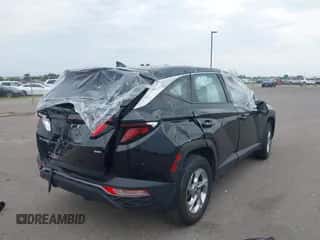 2023 Hyundai Tucson SE with VIN 5NMJACAE9PH183812, listed as a IAAI auction lot 43050593 with 18,512 mi miles and . Bid and sale history available at DreamBid. Image 4.