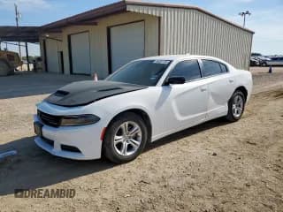 ✅ 2023 Dodge Charger SXT • VIN: 2C3CDXBG9PH547153 • Lot: 84402125. Listed on Copart with 64,004 mi. Free auction sales archive from the USA and detailed vehicle history report at DreamBid. Image 1.