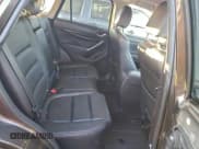 ✅ 2016 Mazda CX-5 Grand Touring • VIN: JM3KE2DY4G0906899 • Lot: 93922385. Wystawiony na Copart z przebiegiem 81 571 mil. Bezpłatny archiwum sprzedaży aukcyjnych z USA i szczegółowy raport historii pojazdu na DreamBid. Zdjęcie 11.