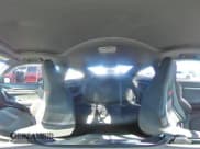 ✅ 2018 Honda Civic Si • VIN: 2HGFC3A54JH750934 • Lot: 86109575. Listed on Copart with 99,965 mi. Free auction sales archive from the USA and detailed vehicle history report at DreamBid. Image 14.