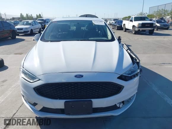 ✅ 2017 Ford Fusion Hybrid Titanium • VIN: 3FA6P0RU3HR323164 • Lot: 42303571. Listed on IAAI with 119,732 mi. Free auction sales archive from the USA and detailed vehicle history report at DreamBid. Image 13.