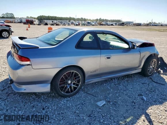 ✅ 2000 Honda Prelude • VIN: JHMBB6141YC001027 • Лот: 85411045. Опубликован ранее на Copart с пробегом 105 593 миль. Бесплатный доступ к архиву аукционных продаж из США и подробный отчёт об истории автомобиля на DreamBid. Изображение 3.