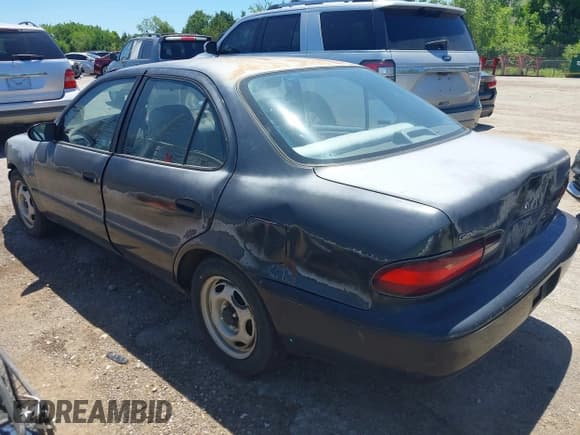 ✅ 1997 Geo Prizm LSi • VIN: 1Y1SK5267VZ447232 • Lot: 42289597. Listed on IAAI with 100,974 mi. Free auction sales archive from the USA and detailed vehicle history report at DreamBid. Image 3.