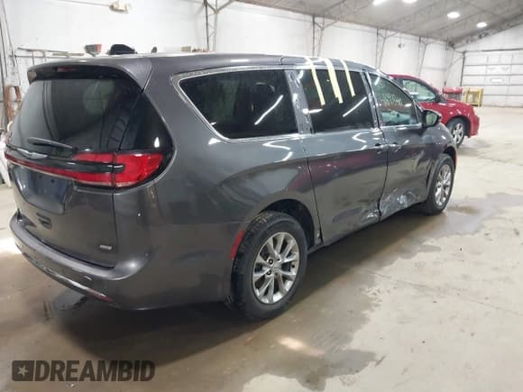 ✅ 2023 Chrysler Pacifica Touring L • VIN: 2C4RC3BG0PR570560 • Lot: 41891340. Listed on IAAI with 63,333 mi. Free auction sales archive from the USA and detailed vehicle history report at DreamBid. Image 4.