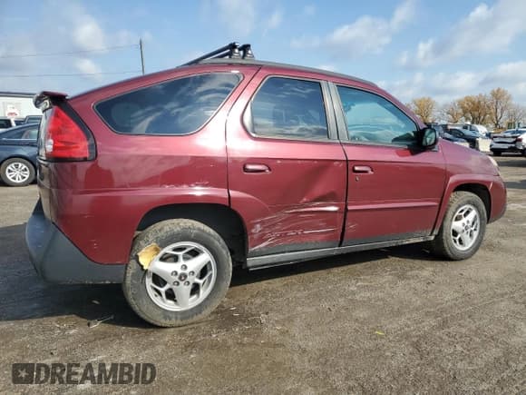 ✅ 2003 Pontiac Aztek • VIN: 3G7DA03E53S586194 • Lot: 77698474. Listed on Copart with 112,779 mi. Free auction sales archive from the USA and detailed vehicle history report at DreamBid. Image 3.