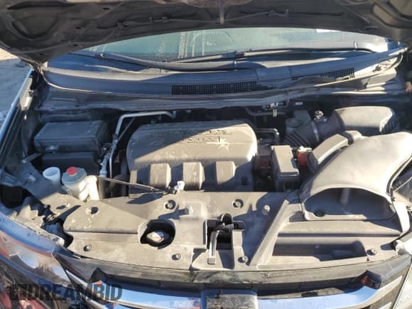 ✅ 2017 Honda Odyssey Touring • VIN: 5FNRL5H94HB009506 • Лот: 91265885. Опубликован ранее на Copart с пробегом 91 981 миль. Бесплатный доступ к архиву аукционных продаж из США и подробный отчёт об истории автомобиля на DreamBid. Изображение 12.