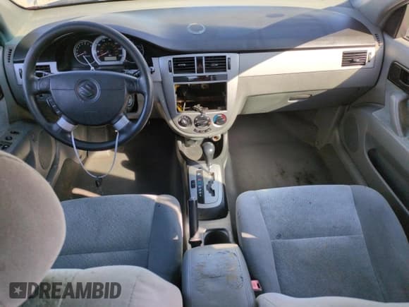 ✅ 2005 Suzuki Forenza S • VIN: KL5JD56Z45K144227 • Lot: 46600015. Listed on Copart with 163,677 mi. Free auction sales archive from the USA and detailed vehicle history report at DreamBid. Image 8.