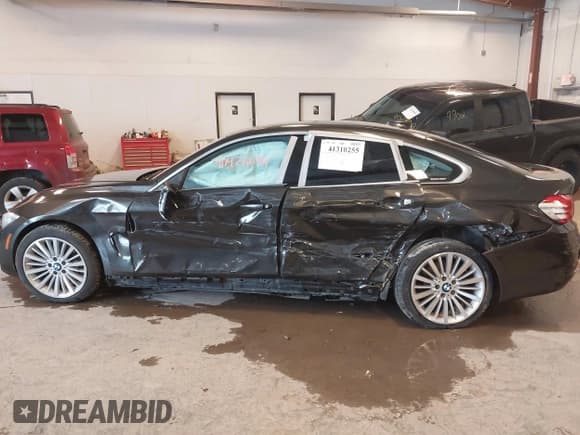 ✅ 2015 BMW 4 Series 435i xDrive • VIN: WBA4B3C54FGV48147 • Lot: 41310255. Listed on IAAI with 93,273 mi. Free auction sales archive from the USA and detailed vehicle history report at DreamBid. Image 14.