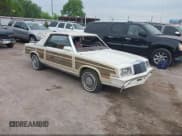 ✅ 1984 Chrysler LeBaron • VIN: 1C3BC55G7EG131271 • Lot: 42896060. Listed on IAAI with 107,280 mi. Free auction sales archive from the USA and detailed vehicle history report at DreamBid. Image 1.