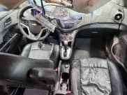 ✅ 2013 Chevrolet Sonic LTZ • VIN: 1G1JE6SB3D4211398 • Lot: 93627505. Listed on Copart with 109,453 mi. Free auction sales archive from the USA and detailed vehicle history report at DreamBid. Image 8.