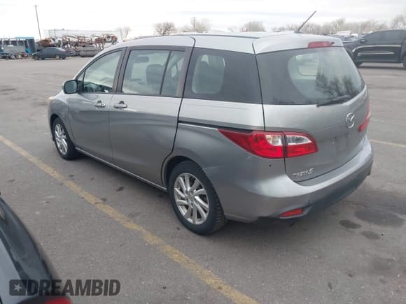 ✅ 2012 Mazda 5 Sport • VIN: JM1CW2BL8C0101127 • Lot: 43899580. Wystawiony na IAAI z przebiegiem 176 755 mil. Bezpłatny archiwum sprzedaży aukcyjnych z USA i szczegółowy raport historii pojazdu na DreamBid. Zdjęcie 3.