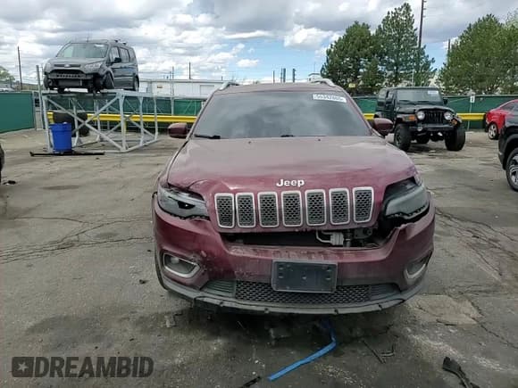 ✅ 2019 Jeep Cherokee Limited • VIN: 1C4PJMDX2KD351644 • Lot: 55342865. Listed on Copart with 65,570 mi. Free auction sales archive from the USA and detailed vehicle history report at DreamBid. Image 13.
