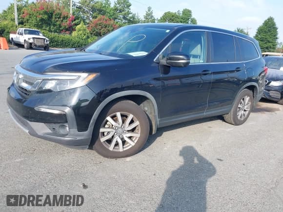 ✅ 2019 Honda Pilot EX-L • VIN: 5FNYF5H53KB000917 • Lot: 42789596. Listed on IAAI with 173,626 mi. Free auction sales archive from the USA and detailed vehicle history report at DreamBid. Image 2.