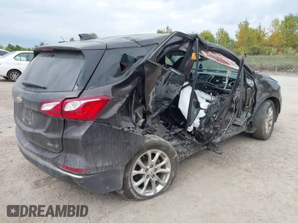 2020 Chevrolet Equinox LT with VIN 2GNAXUEV2L6207908, listed as a IAAI auction lot 43266977 with 105,014 mi miles and . Bid and sale history available at DreamBid. Image 4.