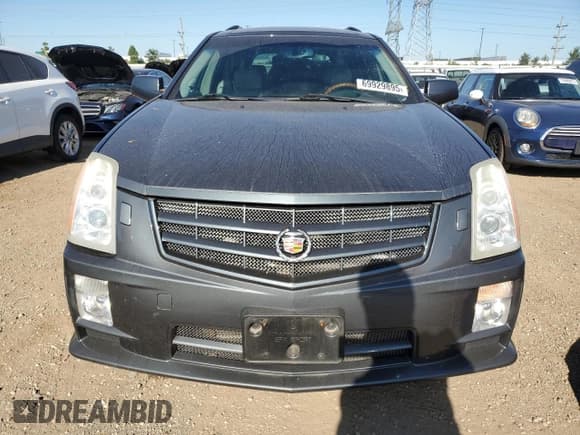 ✅ 2009 Cadillac SRX AWD • VIN: 1GYEE437990110026 • Лот: 69929895. Опубликован ранее на Copart с пробегом 137 379 миль. Бесплатный доступ к архиву аукционных продаж из США и подробный отчёт об истории автомобиля на DreamBid. Изображение 5.