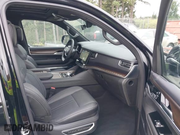 ✅ 2023 Jeep Grand Wagoneer • VIN: 1C4SJVEJ2PS573498 • Lot: 42684957. Listed on IAAI with 7,334 mi. Free auction sales archive from the USA and detailed vehicle history report at DreamBid. Image 5.