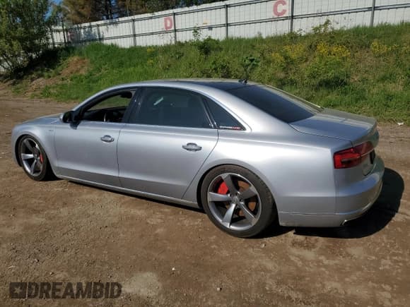 ✅ 2015 Audi A8 4.0T • VIN: WAU32AFDXFN020918 • Лот: 56711155. Опубликован ранее на Copart с пробегом 103 368 миль. Бесплатный доступ к архиву аукционных продаж из США и подробный отчёт об истории автомобиля на DreamBid. Изображение 2.