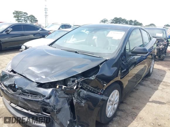 ✅ 2022 Toyota Prius L Eco • VIN: JTDKAMFU8N3181135 • Lot: 42098611. Listed on IAAI with 69,949 mi. Free auction sales archive from the USA and detailed vehicle history report at DreamBid. Image 6.