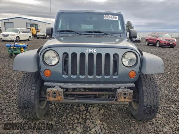 ✅ 2007 Jeep Wrangler Unlimited X • VIN: 1J8GA391X7L176502 • Лот: 95843065. Опубликован ранее на Copart с пробегом 77 887 миль. Бесплатный доступ к архиву аукционных продаж из США и подробный отчёт об истории автомобиля на DreamBid. Изображение 5.