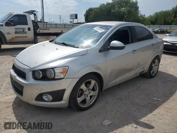 2012 Chevrolet Sonic LTZ с VIN 1G1JE5SH8C4108328, выставлен на аукционе Copart как лот 80509915 с пробегом 111 625 миль миль и Списание • Salvage title. История ставок и продаж доступна на DreamBid. Изображение 1.