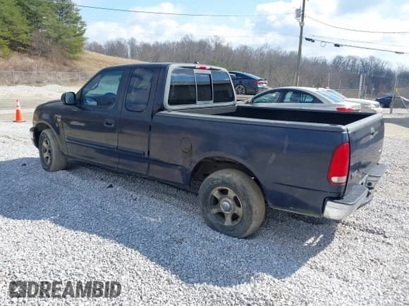 ✅ 2001 Ford F-150 XL • VIN: 1FTRX17W41NA28584 • Lot: 41656724. Listed on IAAI with 168,400 mi. Free auction sales archive from the USA and detailed vehicle history report at DreamBid. Image 3.
