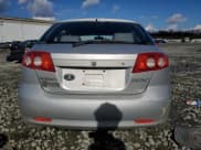 ✅ 2007 Suzuki Reno • VIN: KL5JD66Z57K670570 • Лот: 79906524. Опубликован ранее на Copart с пробегом 126 550 миль. Бесплатный доступ к архиву аукционных продаж из США и подробный отчёт об истории автомобиля на DreamBid. Изображение 6.