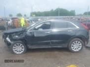 ✅ 2023 Cadillac XT4 AWD Luxury • VIN: 1GYFZBR40PF200976 • Lot: 39503922. Listed on IAAI with 9,403 mi. Free auction sales archive from the USA and detailed vehicle history report at DreamBid. Image 13.