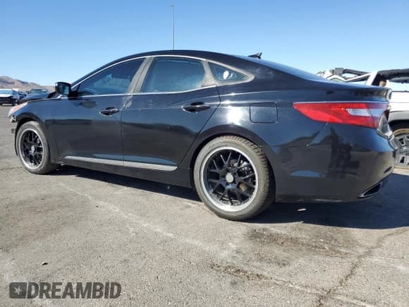 ✅ 2013 Hyundai Azera • VIN: KMHFH4JG9DA257319 • Лот: 66624095. Опубликован ранее на Copart с пробегом 84 409 миль. Бесплатный доступ к архиву аукционных продаж из США и подробный отчёт об истории автомобиля на DreamBid. Изображение 2.