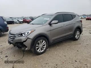 ✅ 2018 Hyundai Santa Fe 2.0T • VIN: 5XYZU4LA4JG536212 • Лот: 39029963. Опубликован ранее на Copart с пробегом 74 993 миль. Бесплатный доступ к архиву аукционных продаж из США и подробный отчёт об истории автомобиля на DreamBid. Изображение 1.