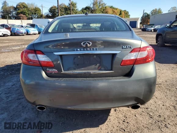 ✅ 2012 Infiniti M • VIN: JN1BY1AR7CM390003 • Lot: 82330875. Listed on Copart with 147,864 mi. Free auction sales archive from the USA and detailed vehicle history report at DreamBid. Image 6.