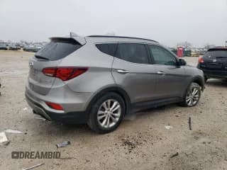 ✅ 2018 Hyundai Santa Fe 2.0T • VIN: 5XYZU4LA4JG536212 • Лот: 39029963. Опубликован ранее на Copart с пробегом 74 993 миль. Бесплатный доступ к архиву аукционных продаж из США и подробный отчёт об истории автомобиля на DreamBid. Изображение 3.