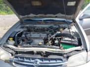 ✅ 1999 Nissan Altima XE • VIN: 1N4DL01D9XC118203 • Lot: 42653411. Wystawiony na IAAI z przebiegiem 112 099 mil. Bezpłatny archiwum sprzedaży aukcyjnych z USA i szczegółowy raport historii pojazdu na DreamBid. Zdjęcie 10.