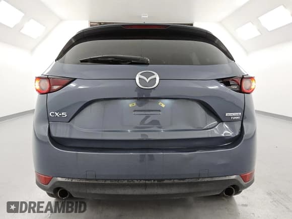 ✅ 2021 Mazda CX-5 Carbon Edition • VIN: JM3KFACY6M0410510 • Lot: 58585435. Listed on Copart with 56,319 mi. Free auction sales archive from the USA and detailed vehicle history report at DreamBid. Image 6.