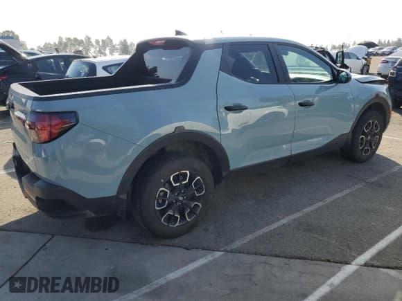 ✅ 2023 Hyundai Santa Cruz SEL • VIN: 5NTJB4AE2PH061557 • Lot: 82627805. Wystawiony na Copart z przebiegiem 38 721 mil. Bezpłatny archiwum sprzedaży aukcyjnych z USA i szczegółowy raport historii pojazdu na DreamBid. Zdjęcie 3.