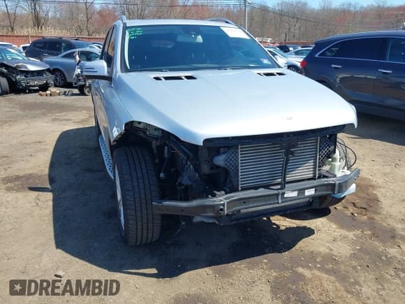 ✅ 2014 Mercedes-Benz M 350 • VIN: 4JGDA2EB9EA320466 • Lot: 41994342. Listed on IAAI with 102,791 mi. Free auction sales archive from the USA and detailed vehicle history report at DreamBid. Image 17.