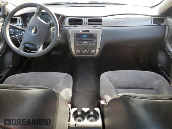 2014 Chevrolet Impala Police Police с VIN 2G1WD5E36E1178028, выставлен на аукционе Copart как лот 52032825 с пробегом 184 063 миль миль и Списание • Salvage title. История ставок и продаж доступна на DreamBid. Изображение 8.