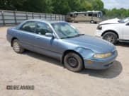 ✅ 1997 Mazda 626 DX • VIN: 1YVGE22CXV5664944 • Lot: 43037583. Listed on IAAI with 273,792 mi. Free auction sales archive from the USA and detailed vehicle history report at DreamBid. Image 1.