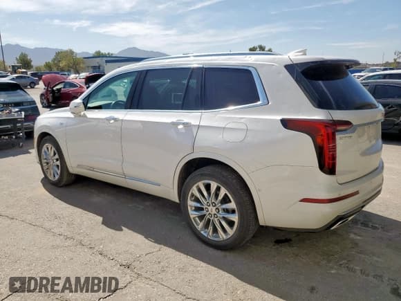 ✅ 2022 Cadillac XT6 Premium Luxury • VIN: 1GYKPCRS6NZ114320 • Lot: 68130115. Listed on Copart with 26,530 mi. Free auction sales archive from the USA and detailed vehicle history report at DreamBid. Image 2.