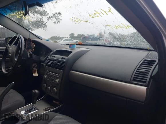 ✅ 2011 Mitsubishi Galant FE • VIN: 4A32B2FF1BE018648 • Lot: 43450337. Listed on IAAI with 103,795 mi. Free auction sales archive from the USA and detailed vehicle history report at DreamBid. Image 5.